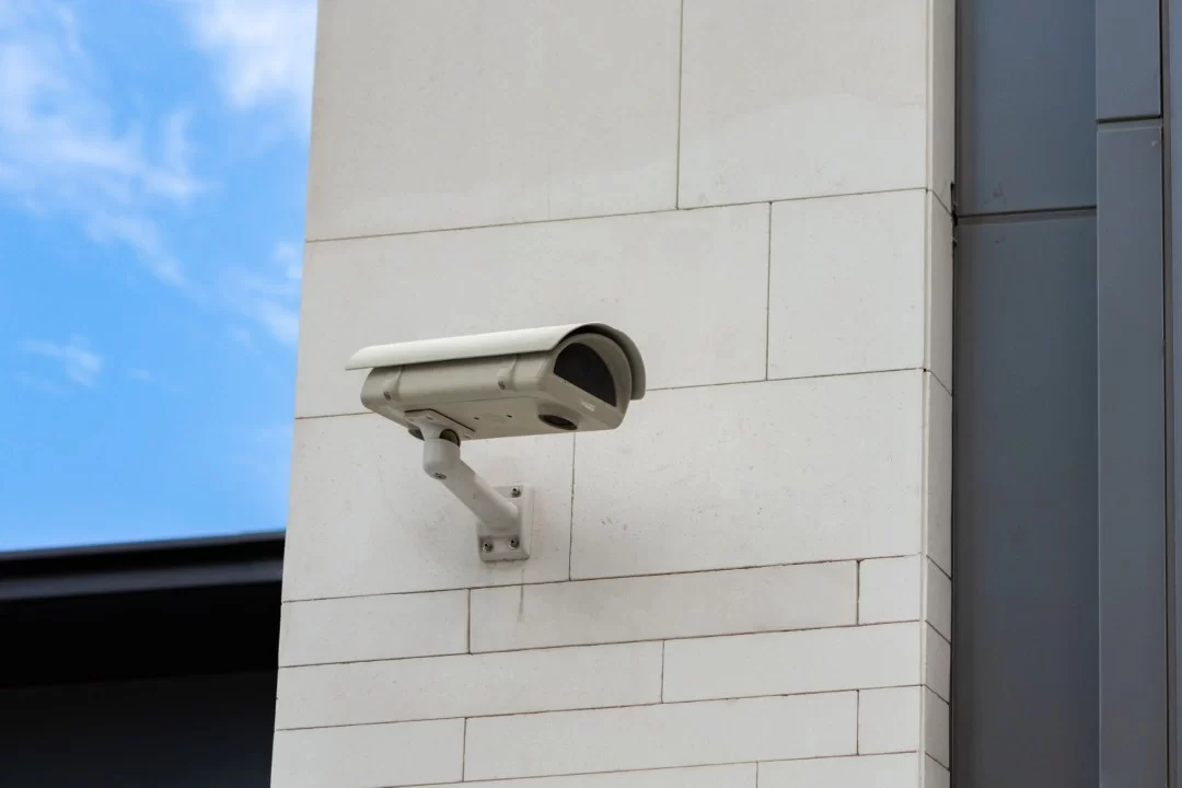 surveillance-camera-built-into-stone-wall-building